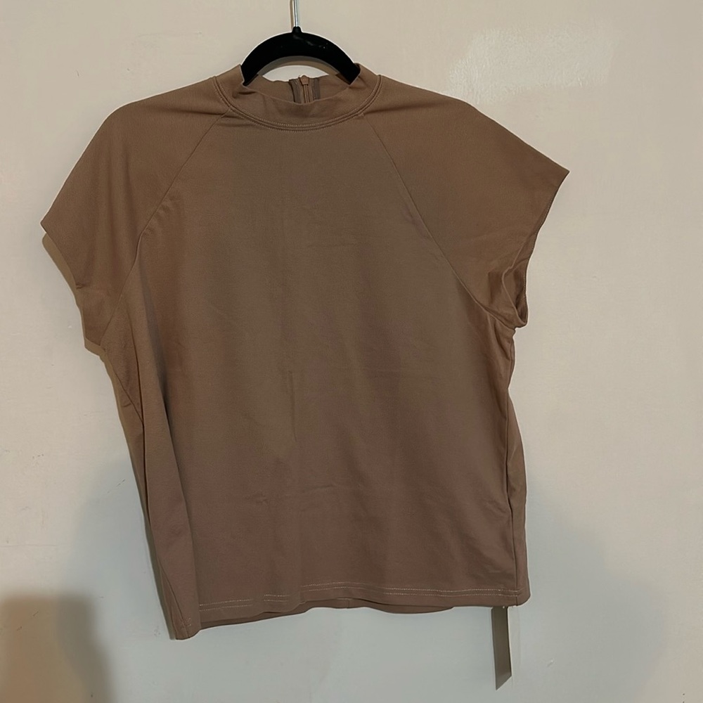 New never worn shirt Size M